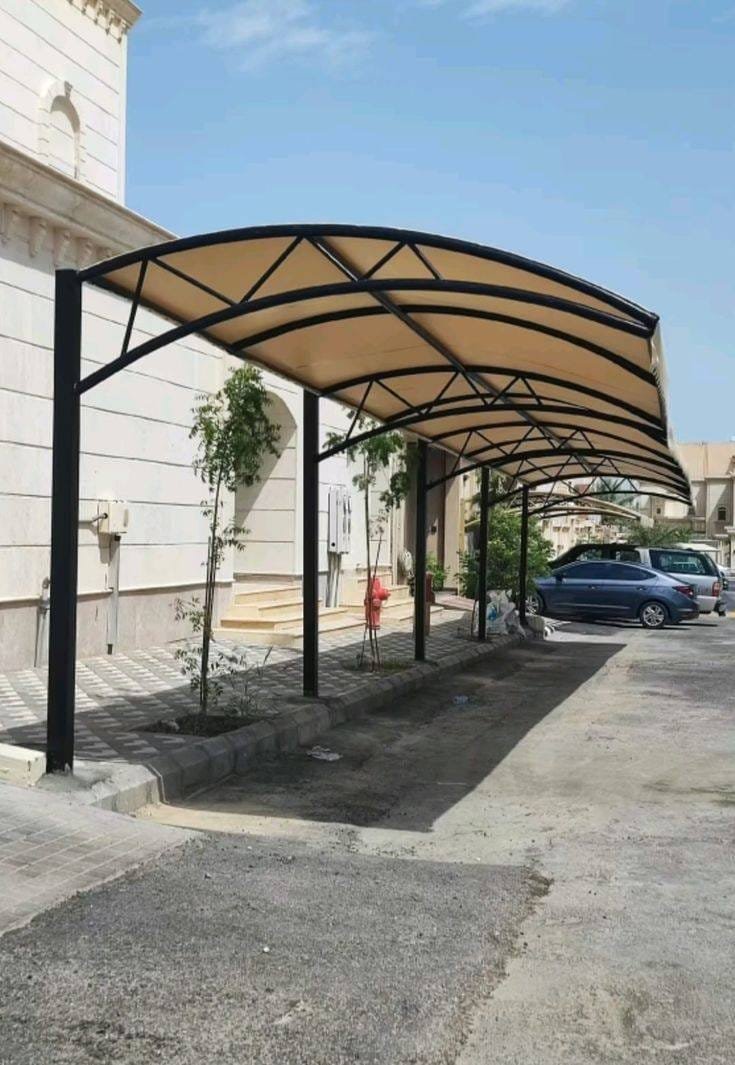 مظلات سيارات هرمية | حداد مظلات وسواتر الرياض